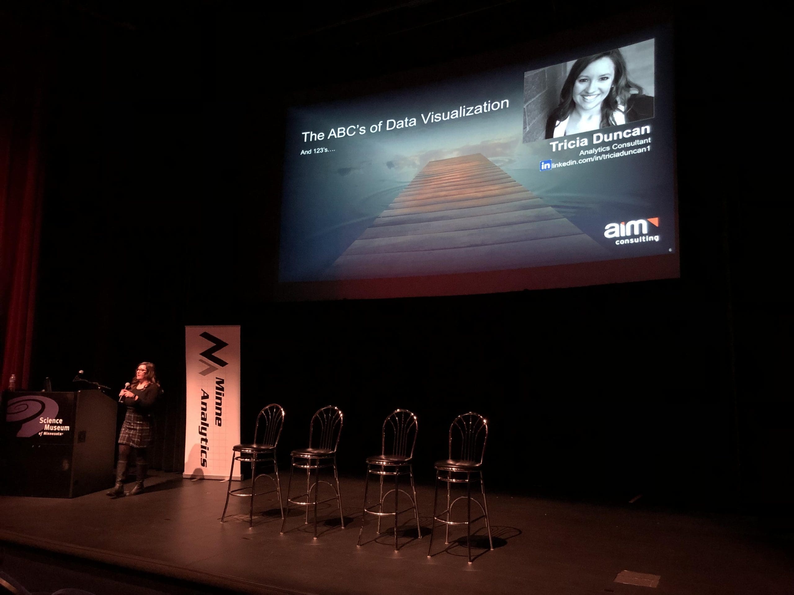 AIM Consulting Consultant Tricia Duncan speaking at MinneFRAMA analytics conference 2018